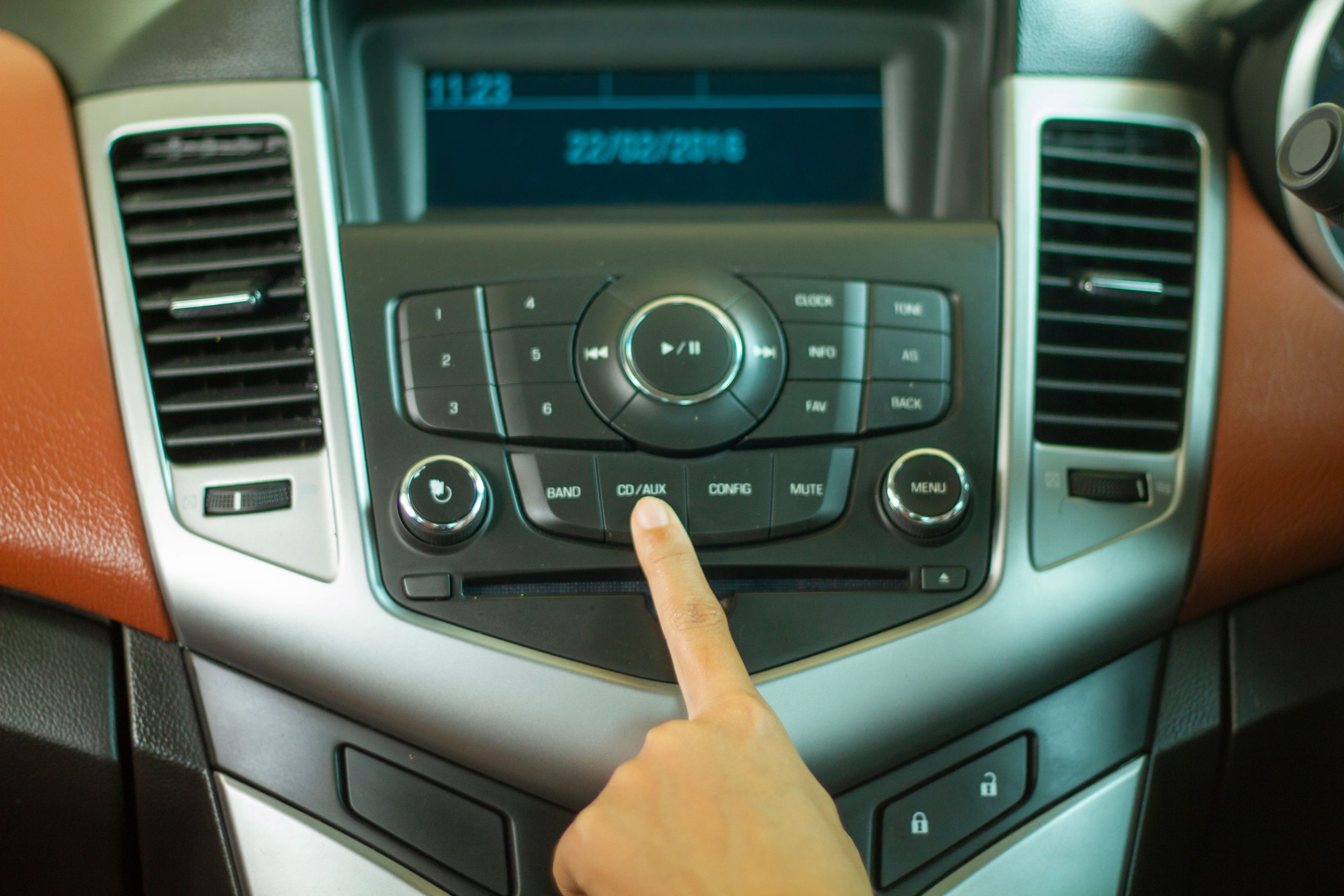 vecteezy asian women press button on car radio for listening to music 6638399
