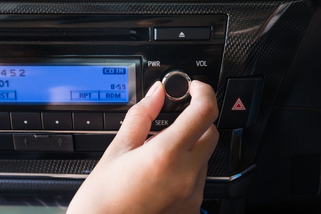 vecteezy woman using car volume audio control 10321796